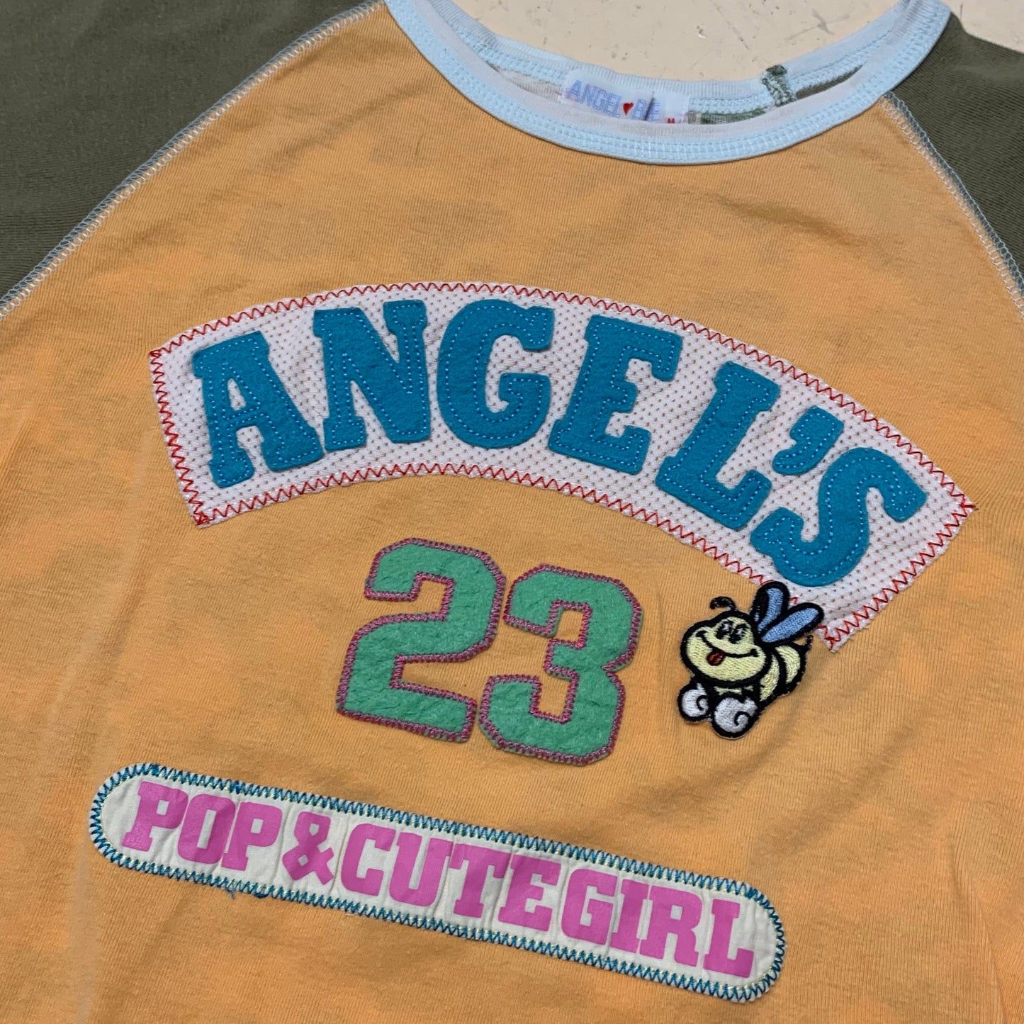 Angel Blue ‘23’ Camo Top