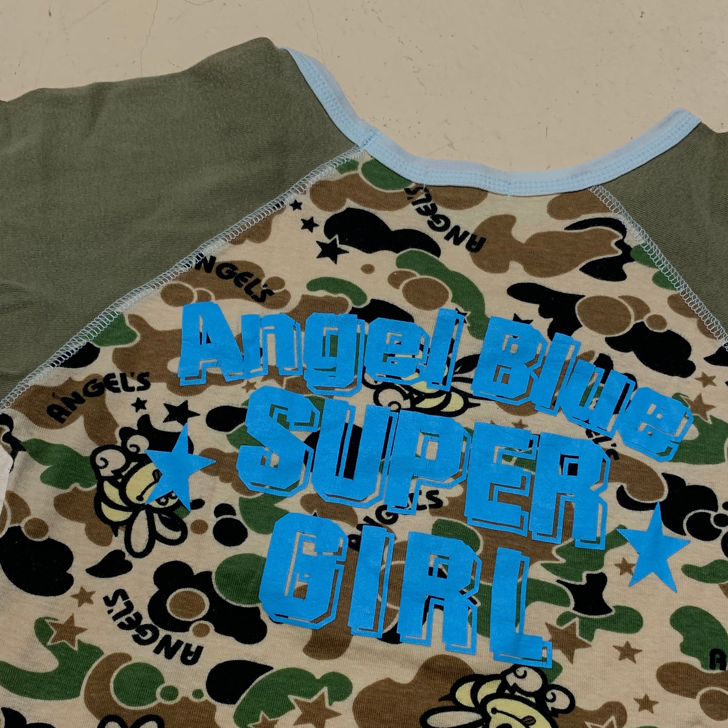 Angel Blue ‘23’ Camo Top