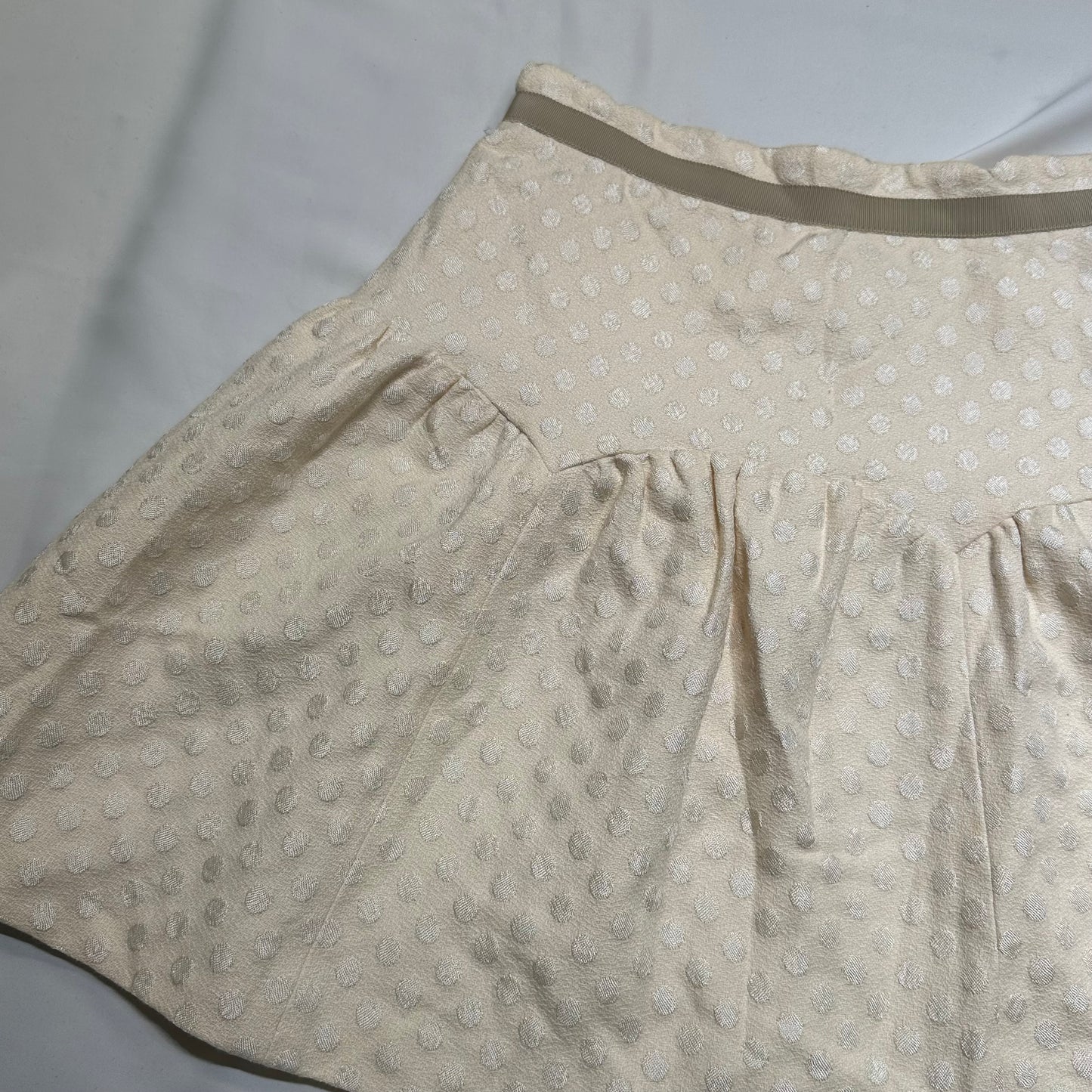 Polka Dot Peplum Mini Skirt